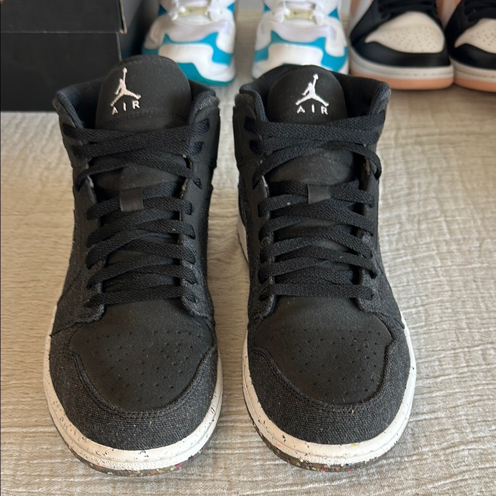 Air Jordan 1 Black and Men's Sneakers. Recycled materials.